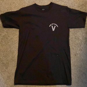 A vans short sleeve shirt that’s black.